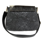Black leather handbag with floral embossing 