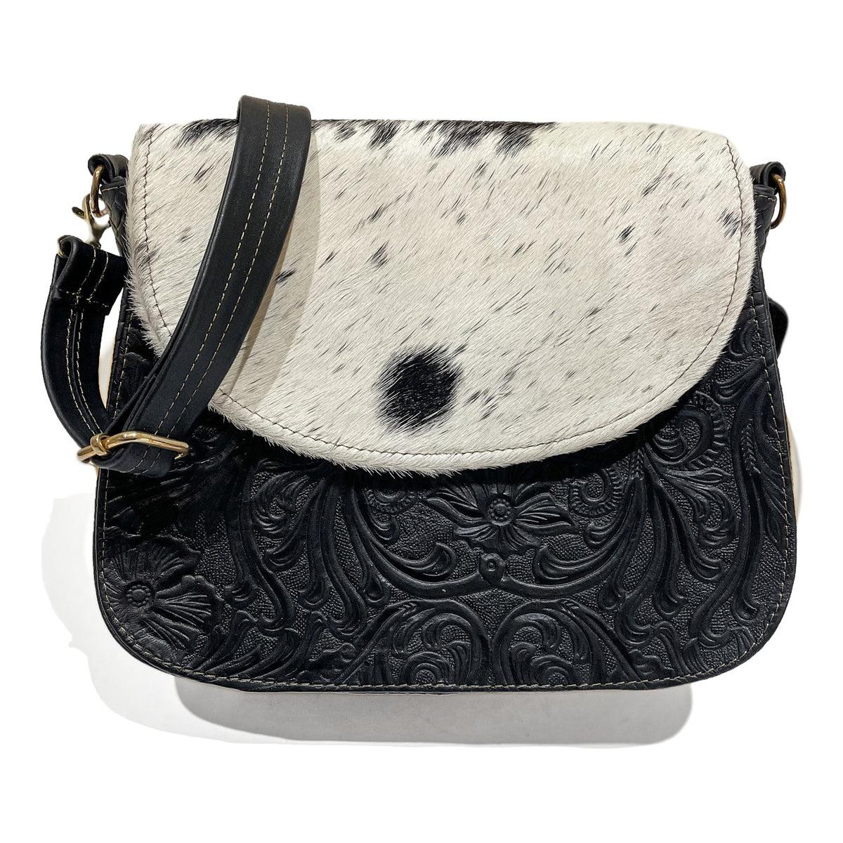 Black and white cowhide leather bag with floral embossing 