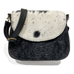 Black and white cowhide leather bag with floral embossing 