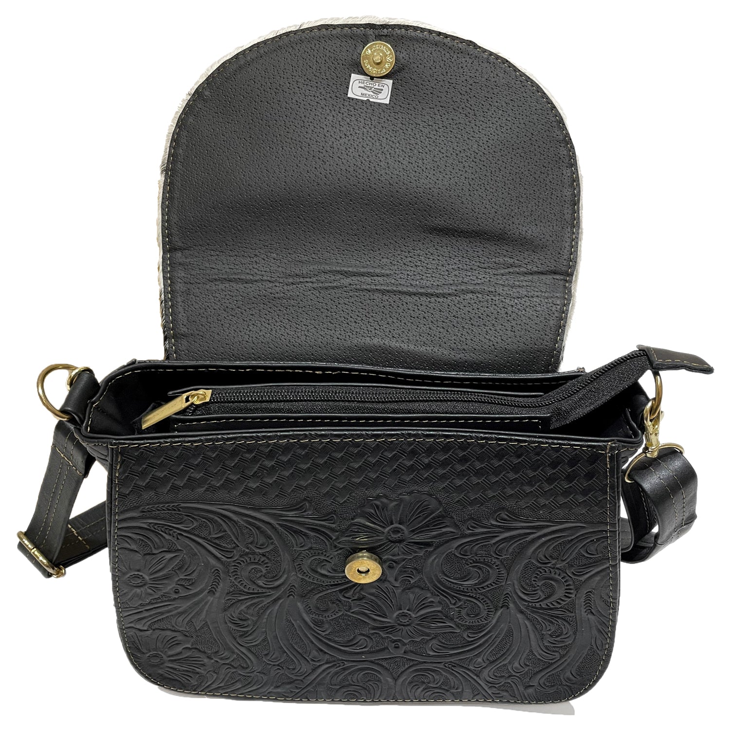 Leather bag made in Mexico with detailed patterns and gold hardware 