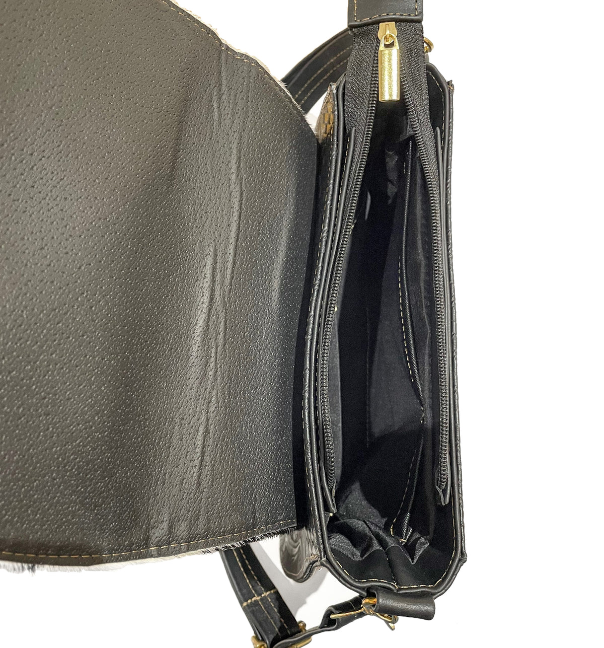 Inside shot of leather crossbody bag with inside compartments 