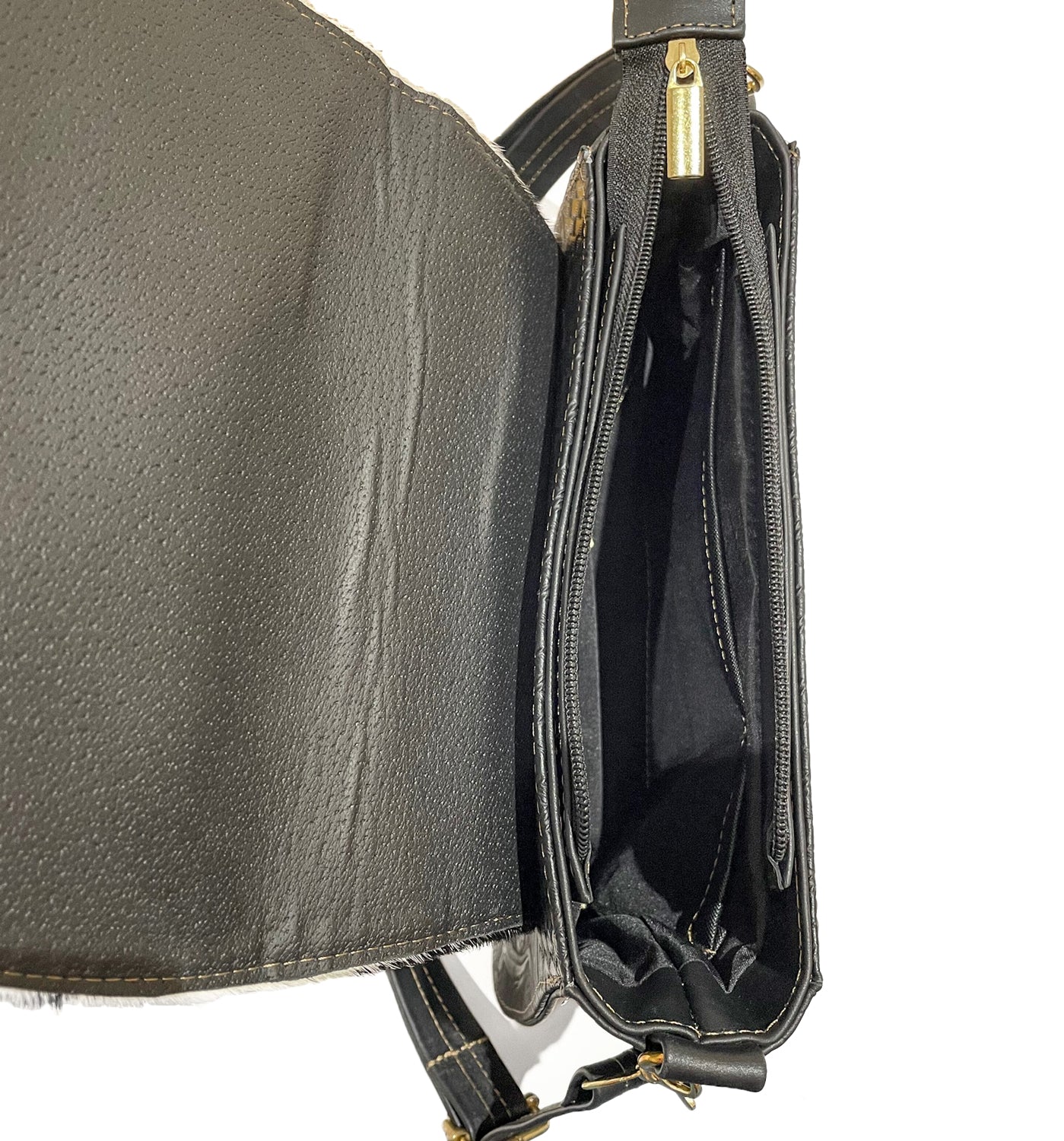 Inside shot of leather crossbody bag with inside compartments 