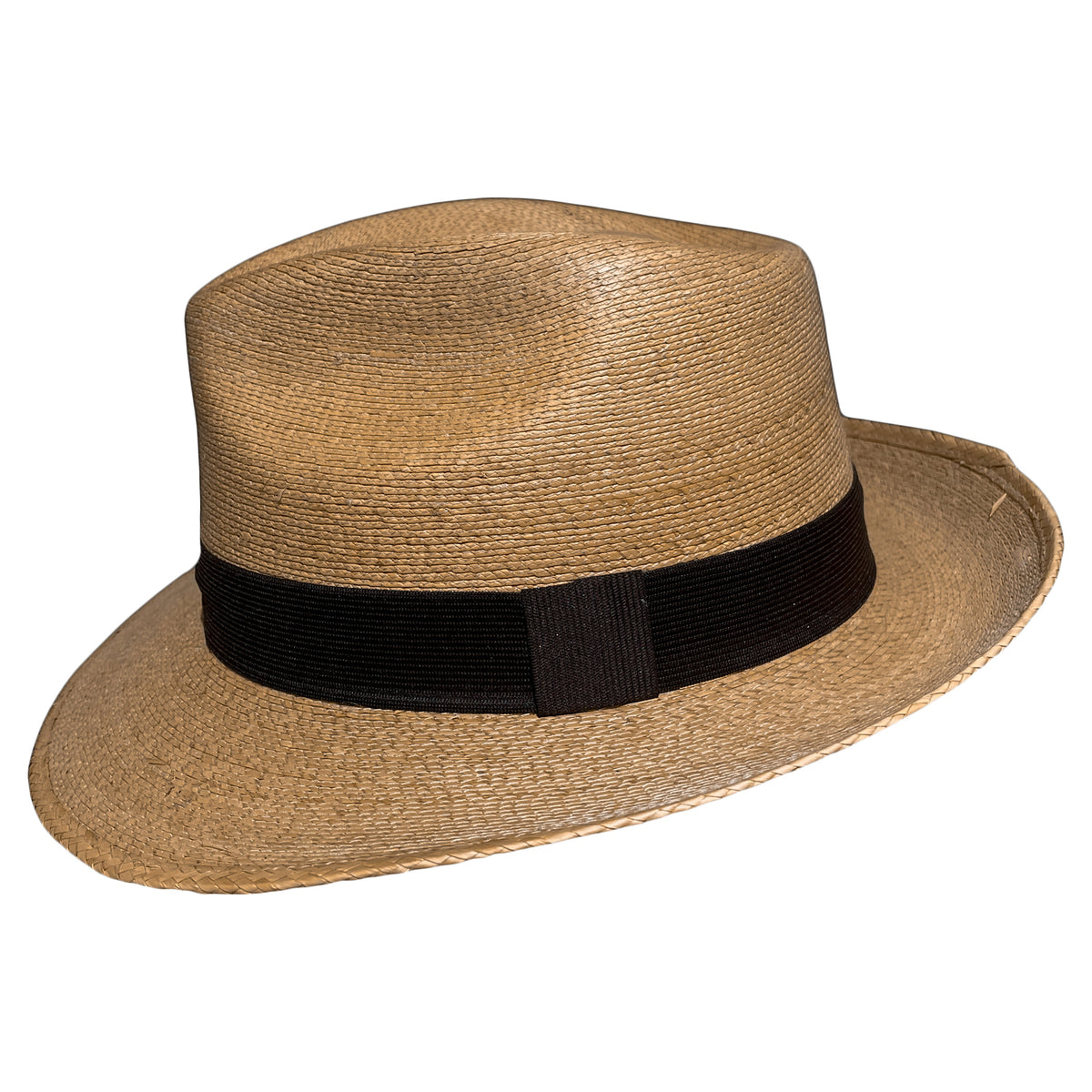 Side profile of Tan-Brown Fedora Fino handwoven palm leaf fedora showing its breathable weave, crown eyelets, and classic 2⅜-inch brim. 