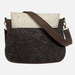 artisan cowhide purse with adjustable strap 