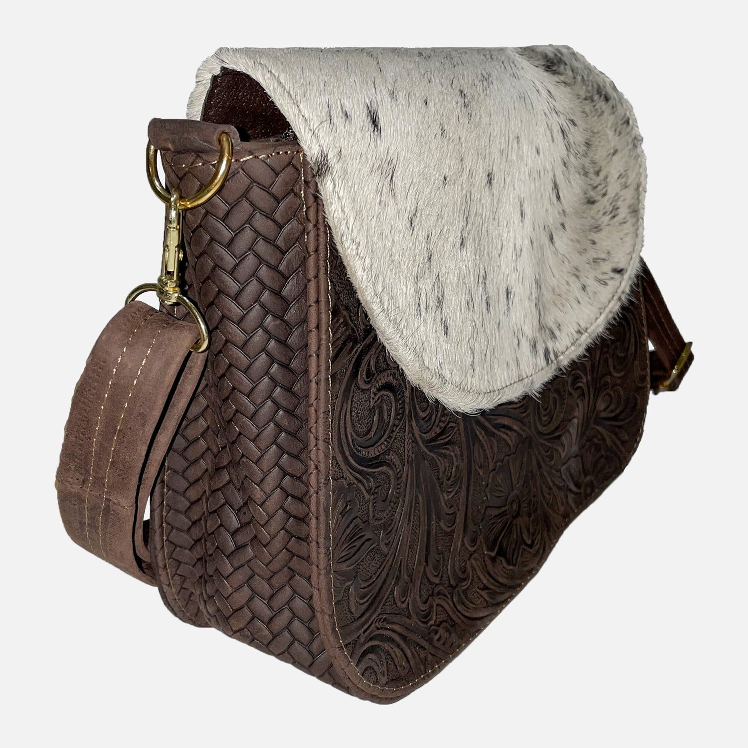 Brown cowhide soft leather bag with cow pattern and intricate details 