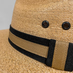 Close-up of Tan-Beige Fedora Fino showing the handwoven Mexican palm leaf texture and traditional artisan craftsmanship. 