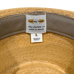 Interior close up of Tan-Beige Fedora Fino showing the Latin's Hand "Made in Mexico" tag, the soft, comfortable cotton sweatband, and the inner straw weave. 