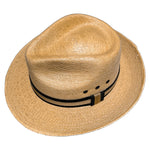 Top view of Tan-Beige Fedora Fino handcrafted from genuine Mexican palm leaf with a lightweight woven straw construction. 