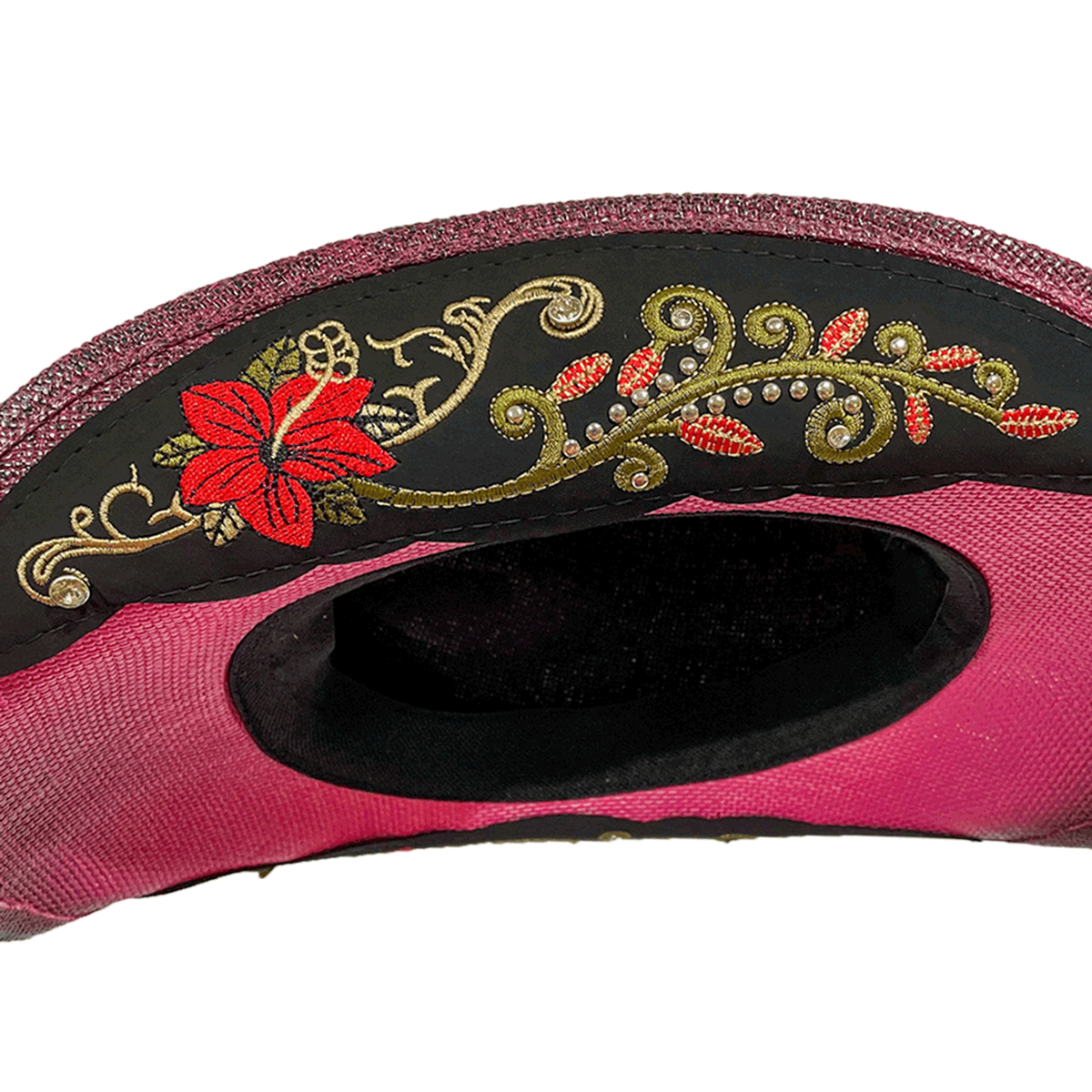 Detailed shot of Mexican artisanal floral embroidery on a handwoven pink authentic western hat 