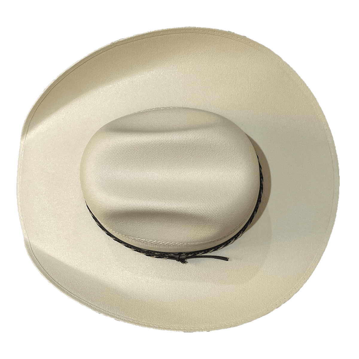 Top view of natural fiber cowboy hat with wide, curved brim 
